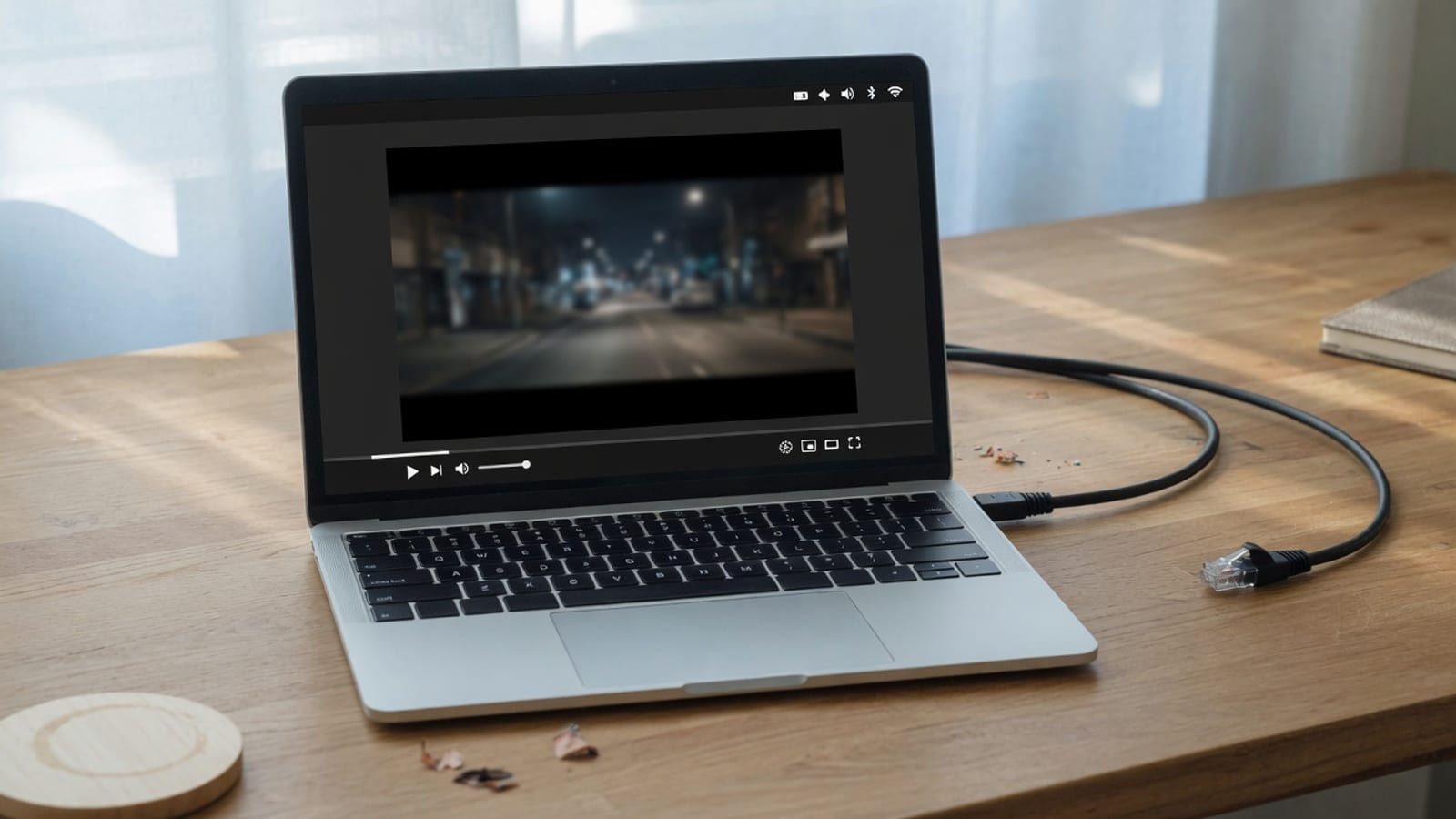 Laptop playing media locally with the network cable unplugged on the desk